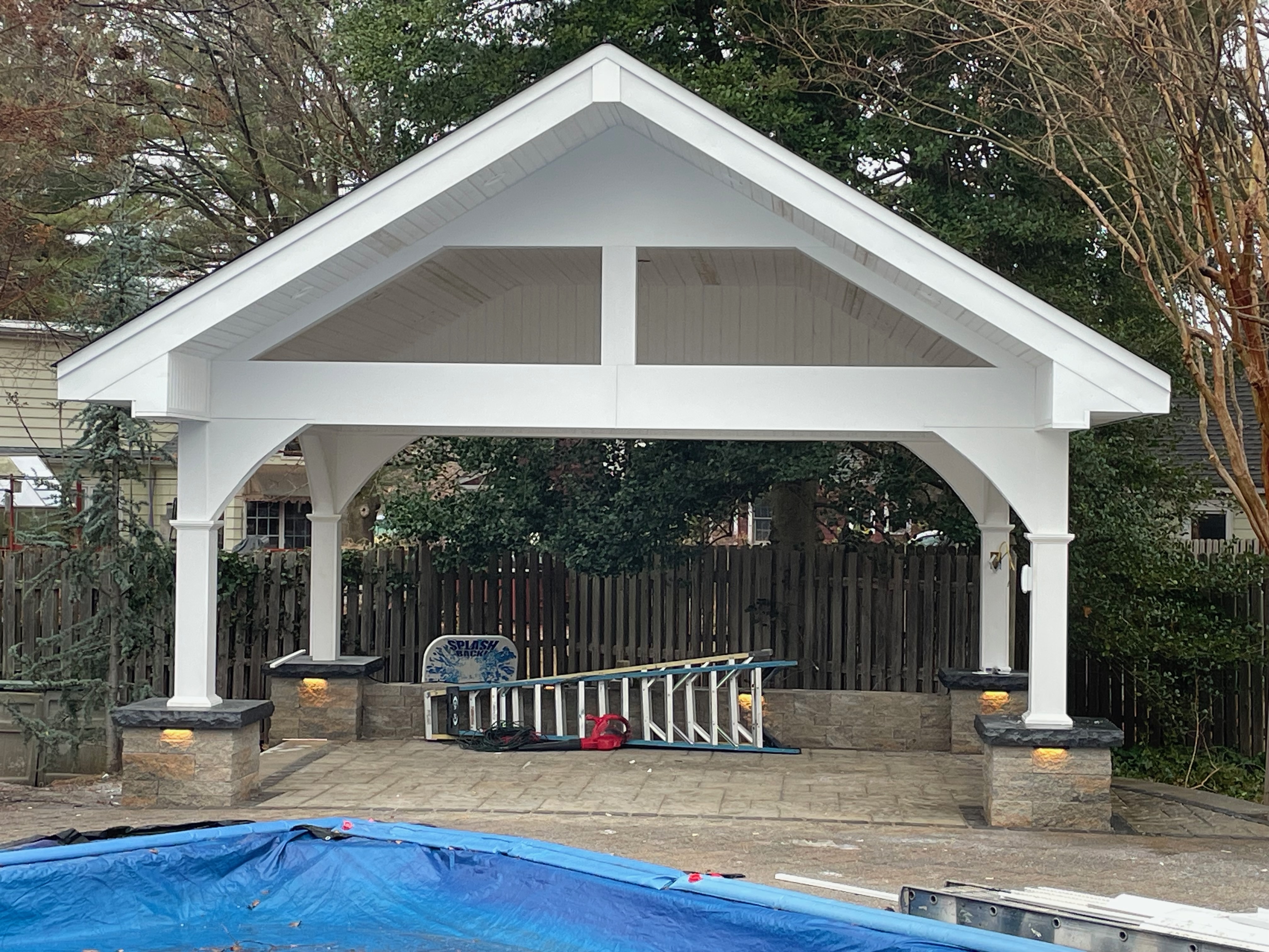 Outdoor pavilion build — white post and beam structure